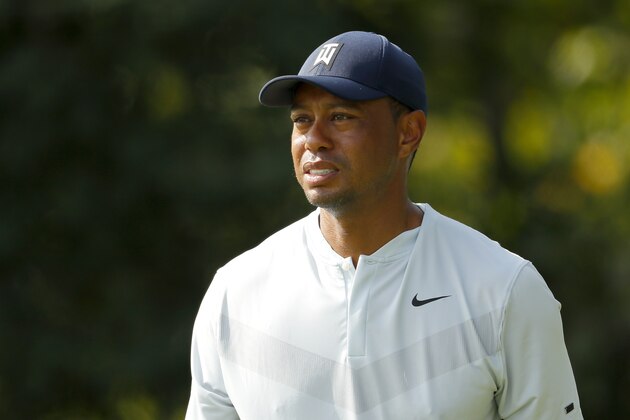 JERSEY CITY, NEW JERSEY - AUGUST 08: Tiger Woods of the United States hits off the 18th tee during the first round of The Northern Trust at Liberty National Golf Club on August 08, 2019 in Jersey City, New Jersey. (Photo by Kevin C. Cox/Getty Images)