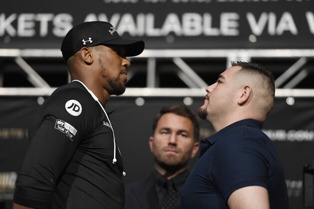 NEW YORK, NEW YORK - MAY 30: Anthony Joshua of the United Kingdom faces off with Andy Ruiz of Mexico during the press conference prior to their world heavyweight title fight at the Beacon Theatre on May 30, 2019 in New York City. (Photo by Sarah Stier/Getty Images)
