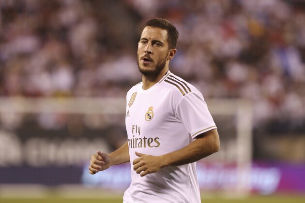 Real Madrid forward Eden Hazard in action during the second half of an International Champions Cup soccer match against Atletico Madrid, Friday, July 26, 2019, in East Rutherford, N.J. Atletico Madrid won 7-3. (AP Photo/Steve Luciano)