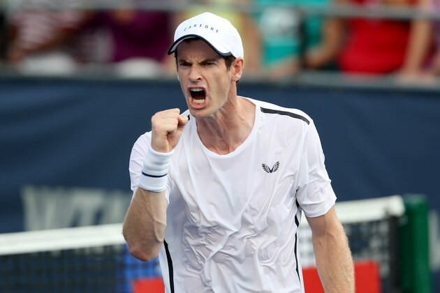 WASHINGTON, DC - AUGUST 02: Andy Murray celebrates a shot while playing with his brother Jamie Murray of Great Britain during their doubles match against Raven Klaasen of Russia and Michael Venus of New Zealand during Day 5 of the Citi Open at Rock Creek Tennis Center on August 02, 2019 in Washington, DC. (Photo by Rob Carr/Getty Images)