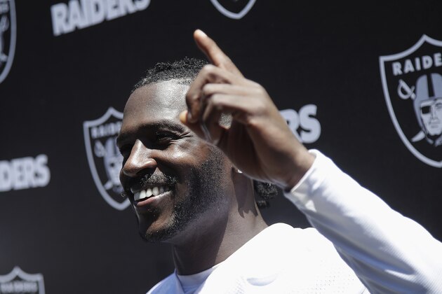 Oakland Raiders wide receiver Antonio Brown speaks to reporters after an official team activity at the NFL football team's headquarters in Alameda, Calif., Tuesday, May 28, 2019. (AP Photo/Jeff Chiu)