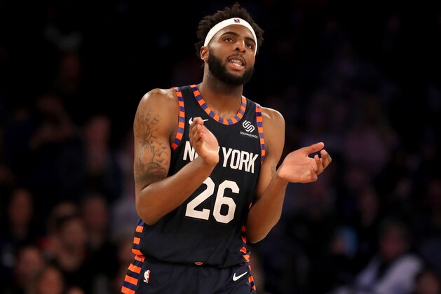 NEW YORK, NEW YORK - APRIL 07:   Mitchell Robinson #26 of the New York Knicks celebrates the win over the Washington Wizards at Madison Square Garden on April 07, 2019 in New York City. The New York Knicks defeated the Washington Wizards 113-110.NOTE TO USER: User expressly acknowledges and agrees that, by downloading and or using this photograph, User is consenting to the terms and conditions of the Getty Images License Agreement. (Photo by Elsa/Getty Images)