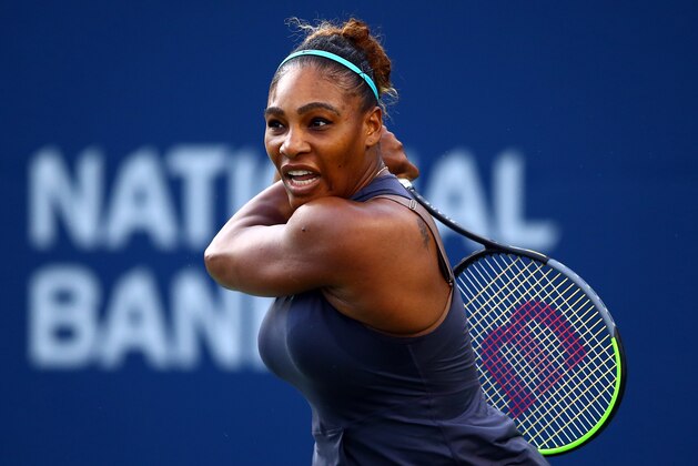 TORONTO, ON - AUGUST 09:  Serena Williams of the United States hits a shot against Naomi Osaka of Japan during a quarterfinal match on Day 7 of the Rogers Cup at Aviva Centre on August 09, 2019 in Toronto, Canada.  (Photo by Vaughn Ridley/Getty Images)