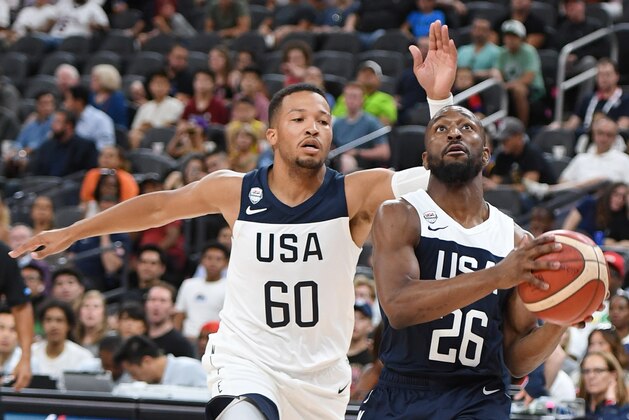 LAS VEGAS, NEVADA - AUGUST 09:  Kemba Walker #26 of the 2019 USA Men's National Team drives to the basket against Jalen Brunson #60 of the 2019 USA Men's Select Team during the 2019 USA Basketball Men's National Team Blue-White exhibition game at T-Mobile Arena on August 9, 2019 in Las Vegas, Nevada.  (Photo by Ethan Miller/Getty Images)