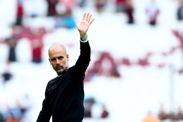 LONDON, ENGLAND - AUGUST 10: Manchester City Manager Pep Guardiola applauds the crowd after winning the Premier League match between West Ham United and Manchester City at London Stadium on August 10, 2019 in London, United Kingdom. (Photo by Chloe Knott - Danehouse/Getty Images )