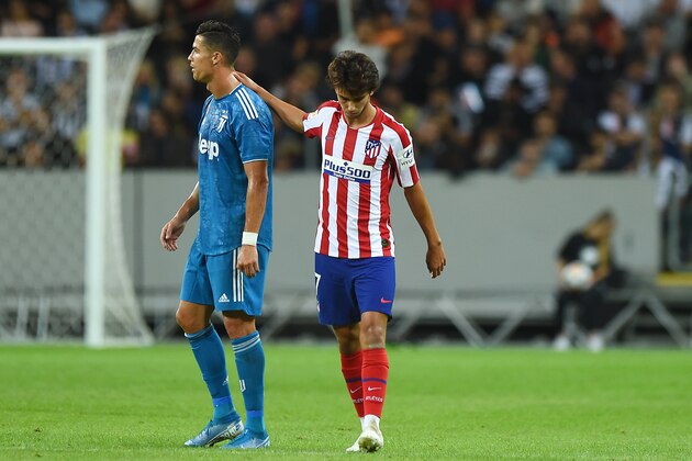 STOCKHOLM, SWEDEN - AUGUST 10:  Joao Felix of Atletico Madrid reacts to Cristiano Ronaldo of Juventus after scoring a goal to make the score 1-0  during the International Champions Cup match between Atletico Madrid and Juventus on August 10, 2019 in Stockholm, Sweden. (Photo by Denis Doyle/International Champions Cup/Getty Images)