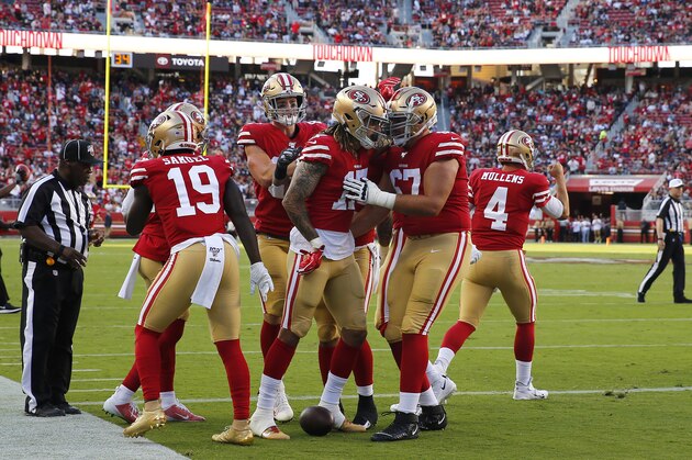 San Francisco 49ers wide receiver Jalen Hurd, center, celebrates with teammates after scoring against the Dallas Cowboys during the first half of an NFL preseason football game in Santa Clara, Calif., Saturday, Aug. 10, 2019. (AP Photo/John Hefti)