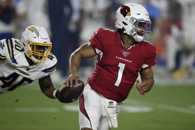 Arizona Cardinals quarterback Kyler Murray (1) tries to elude Los Angeles Chargers linebacker Chris Peace (40) during the first half of an NFL preseason football game, Thursday, Aug. 8, 2019, in Glendale, Ariz. (AP Photo/Ross D. Franklin)