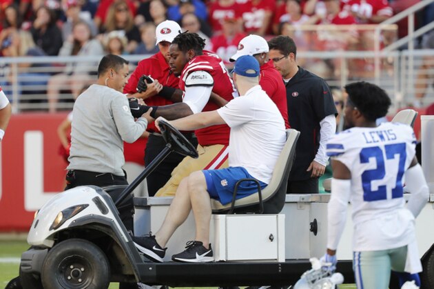 San Francisco 49ers offensive tackle Shon Coleman, center left, is helped onto a cart during the first half of the team's NFL preseason football game against the Dallas Cowboys in Santa Clara, Calif., Saturday, Aug. 10, 2019. (AP Photo/Josie Lepe)
