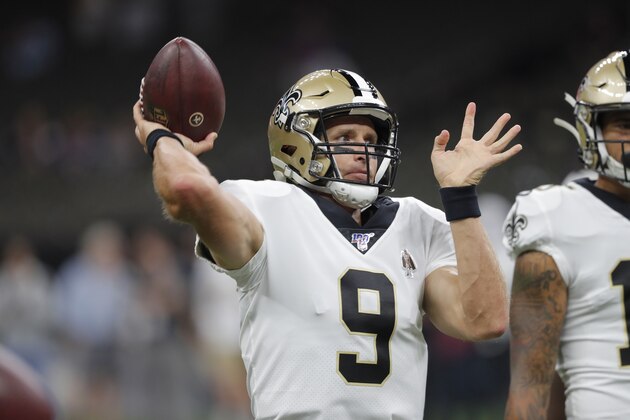New Orleans Saints quarterback Drew Brees (9) warms up before an NFL preseason football game against the Minnesota Vikings in New Orleans, Friday, Aug. 9, 2019. (AP Photo/Bill Feig)