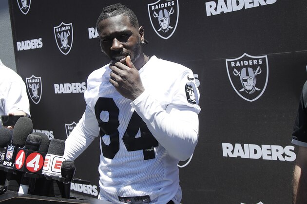 Oakland Raiders wide receiver Antonio Brown speaks to reporters after an official team activity at the NFL football team's headquarters in Alameda, Calif., Tuesday, May 28, 2019. (AP Photo/Jeff Chiu)