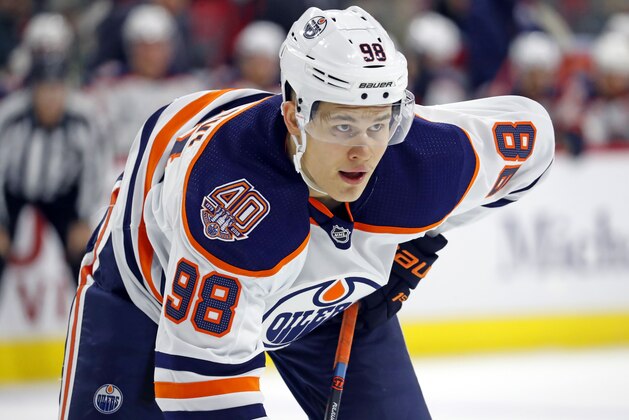 Edmonton Oilers' Jesse Puljujarvi (98) waits for a face-off against the Carolina Hurricanes during the second period of an NHL hockey game, Friday, Feb. 15, 2019, in Raleigh, N.C. (AP Photo/Karl B DeBlaker)