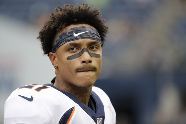 Denver Broncos defensive back Su'a Cravens on the field before an NFL football preseason game against the Seattle Seahawks, Thursday, Aug. 8, 2019, in Seattle. (AP Photo/Elaine Thompson)