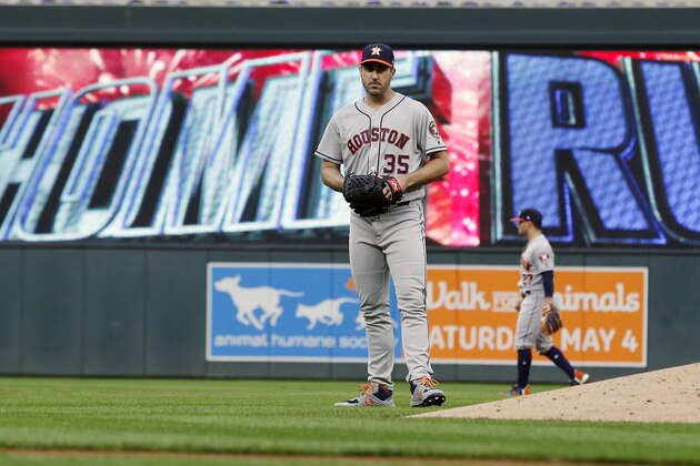 Houston Astros pitcher Justin Verlander  (35) reacts after giving up a solo home run to Minnesota Twins' Ehire Adrianza in the third inning of a baseball game Monday, April 29, 2019, in Minneapolis. (AP Photo/Jim Mone)