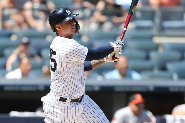 NEW YORK, NEW YORK - AUGUST 12:  Gleyber Torres #25 of the New York Yankees hits a home run to right field in the first inning against the Baltimore Orioles at Yankee Stadium on August 12, 2019 in New York City. (Photo by Mike Stobe/Getty Images)