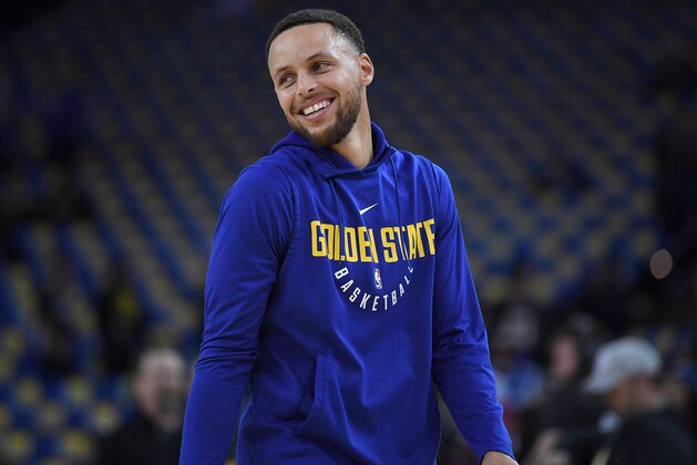 OAKLAND, CA - MARCH 14:  Stephen Curry #30 of the Golden State Warriors laughing while working out prior to the start of an NBA Basketball game against the Los Angeles Lakers at ORACLE Arena on March 14, 2018 in Oakland, California. NOTE TO USER: User expressly acknowledges and agrees that, by downloading and or using this photograph, User is consenting to the terms and conditions of the Getty Images License Agreement.  (Photo by Thearon W. Henderson/Getty Images)