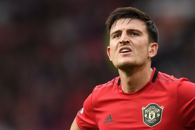 Manchester United's English defender Harry Maguire reacts to their win at the final whistle in the English Premier League football match between Manchester United and Chelsea at Old Trafford in Manchester, north west England, on August 11, 2019. - Manchester United won the game 4-0. (Photo by Oli SCARFF / AFP) / RESTRICTED TO EDITORIAL USE. No use with unauthorized audio, video, data, fixture lists, club/league logos or 'live' services. Online in-match use limited to 120 images. An additional 40 images may be used in extra time. No video emulation. Social media in-match use limited to 120 images. An additional 40 images may be used in extra time. No use in betting publications, games or single club/league/player publications. /         (Photo credit should read OLI SCARFF/AFP/Getty Images)
