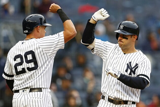 NEW YORK, NY - MAY 5: Mike Tauchman #39 of the New York Yankees celebrates his two-run home run with Gio Urshela #29 of the New York Yankees against the Minnesota Twins during the fourth inning at Yankee Stadium on May 5, 2019 in the Bronx borough of New York City. (Photo by Adam Hunger/Getty Images)