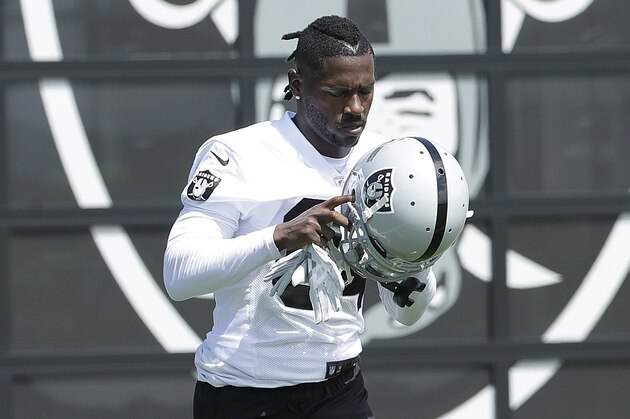 Oakland Raiders wide receiver Antonio Brown runs during an official team activity at the NFL football team's headquarters in Alameda, Calif., Tuesday, May 28, 2019. (AP Photo/Jeff Chiu)