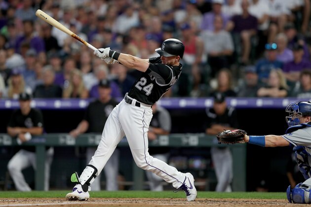 DENVER, COLORADO - JULY 29: Ryan McMahon #24 of the Colorado Rockies hits a 2 RBI double in the fifth inning against the Los Angeles Dodgers at Coors Field on July 29, 2019 in Denver, Colorado. (Photo by Matthew Stockman/Getty Images)