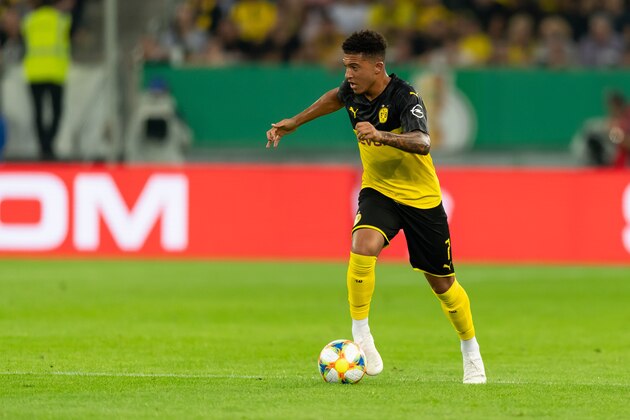 DUESSELDORF,, GERMANY - AUGUST 09: Jadon Sancho of Borussia Dortmund controls the ball during the DFB Cup first round match between KFC Uerdingen and Borussia Dortmund at Merkur Spiel Arena on August 09, 2019 in Duesseldorf, Germany. (Photo by TF-Images/Getty Images)