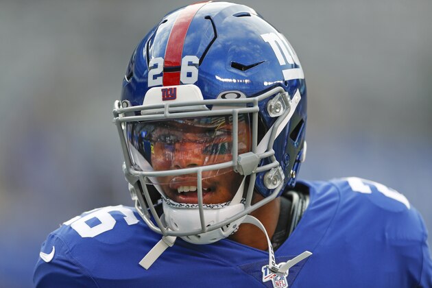 New York Giants running back Saquon Barkley warms up before a preseason NFL football game against the New York Jets Thursday, Aug. 8, 2019, in East Rutherford, N.J. (AP Photo/Michael Owens)