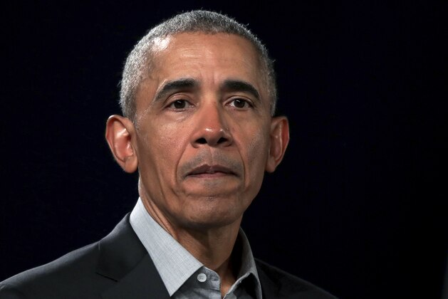 FILE - In this April 6, 2019, file photo, former President Barack Obama attends a town hall meeting at the 'European School For Management And Technology' (ESMT) in Berlin, Germany. In his first public statement since mass shootings in Texas and Ohio, Obama says Americans must