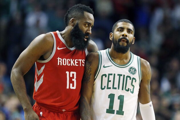 Houston Rockets' James Harden (13) follows Boston Celtics' Kyrie Irving (11) upcourt following a timeout during the fourth quarter of an NBA basketball game in Boston, Thursday, Dec. 28, 2017. (AP Photo/Michael Dwyer)