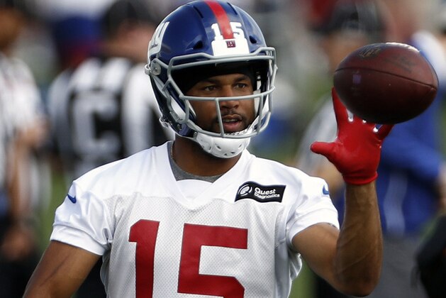 FILE - In this May 20, 2019, file photo, New York Giants wide receiver Golden Tate makes a catch during an NFL football practice in East Rutherford, N.J. Golden Tate has had the appeal of his four-game suspension for a violation of the NFL's policy on performance enhancers turned down. The decision by an independent arbiter was announced Tuesday, Aug. 13, 2019, and means the 10-year-veteran will miss the first four games of the regular season, starting with Dallas on Sept. 8. (AP Photo/Adam Hunger, File)