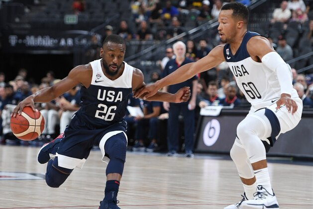 LAS VEGAS, NEVADA - AUGUST 09:  Kemba Walker #26 of the 2019 USA Men's National Team drives against Jalen Brunson #60 of the 2019 USA Men's Select Team during the 2019 USA Basketball Men's National Team Blue-White exhibition game at T-Mobile Arena on August 9, 2019 in Las Vegas, Nevada.  (Photo by Ethan Miller/Getty Images)