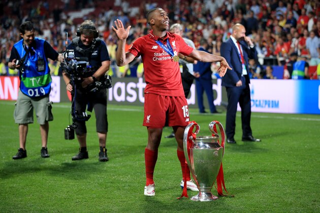 MADRID, SPAIN - JUNE 01: Daniel Sturridge of Liverpool poses with the trophy during the UEFA Champions League Final between Tottenham Hotspur and Liverpool at Estadio Wanda Metropolitano on June 1, 2019 in Madrid, Spain. (Photo by Marc Atkins/Getty Images)