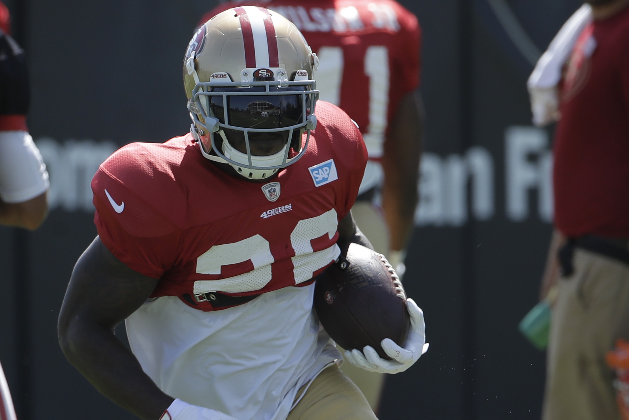 San Francisco 49ers running back Tevin Coleman runs at the team's NFL football training camp in Santa Clara, Calif., Monday, July 29, 2019. (AP Photo/Jeff Chiu)
