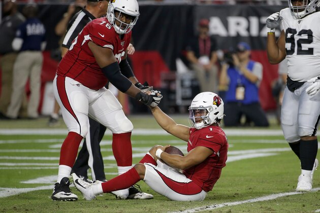 Arizona Cardinals quarterback Kyler Murray (1) is helped up by offensive tackle Marcus Gilbert (76) after being sacked for a safety against the Oakland Raiders during the first half of an an NFL football game, Thursday, Aug. 15, 2019, in Glendale, Ariz. (AP Photo/Rick Scuteri)