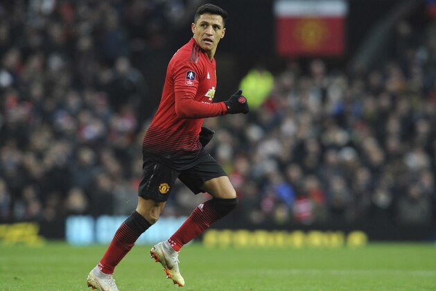 Manchester United's Alexis Sanchez during the English FA Cup third round soccer match between Manchester United and Reading at Old Trafford in Manchester, England, Saturday, Jan. 5, 2019. (AP Photo/Rui Vieira)