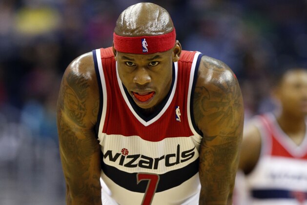 Washington Wizards forward Al Harrington (7) pauses before shooting a free throw in the first half of an NBA basketball game against the Indiana Pacers, Friday, March 28, 2014, in Washington. (AP Photo/Alex Brandon)
