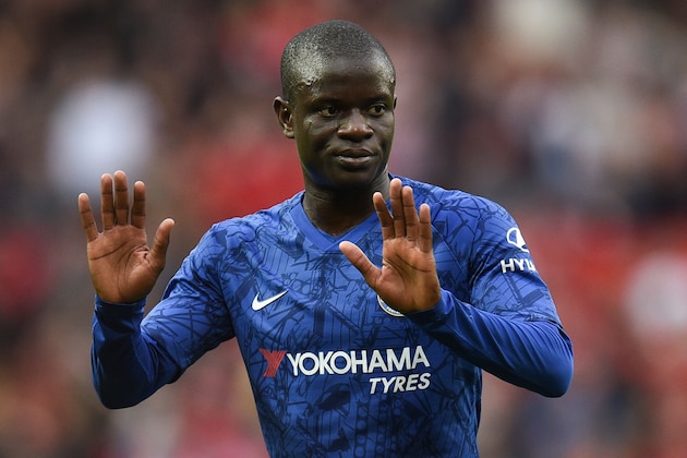 Chelsea's French midfielder N'Golo Kante reacts on the pitch at the final whistle in the English Premier League football match between Manchester United and Chelsea at Old Trafford in Manchester, north west England, on August 11, 2019. - Manchester United won the game 4-0. (Photo by Oli SCARFF / AFP) / RESTRICTED TO EDITORIAL USE. No use with unauthorized audio, video, data, fixture lists, club/league logos or 'live' services. Online in-match use limited to 120 images. An additional 40 images may be used in extra time. No video emulation. Social media in-match use limited to 120 images. An additional 40 images may be used in extra time. No use in betting publications, games or single club/league/player publications. /         (Photo credit should read OLI SCARFF/AFP/Getty Images)