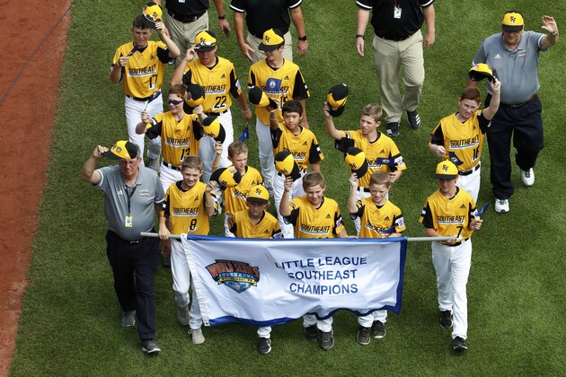 The Southeast Region Champion Little League team from South Riding, Va., participates in the opening ceremony of the 2019 Little League World Series tournament in South Williamsport, Pa., Thursday, Aug. 15, 2019. (AP Photo/Gene J. Puskar)