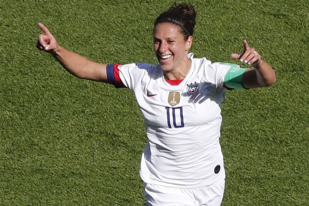 United States' Carli Lloyd celebrates after scoring the opening goal during the Women's World Cup Group F soccer match between the United States and Chile at the Parc des Princes in Paris, Sunday, June 16, 2019. (AP Photo/Thibault Camus)