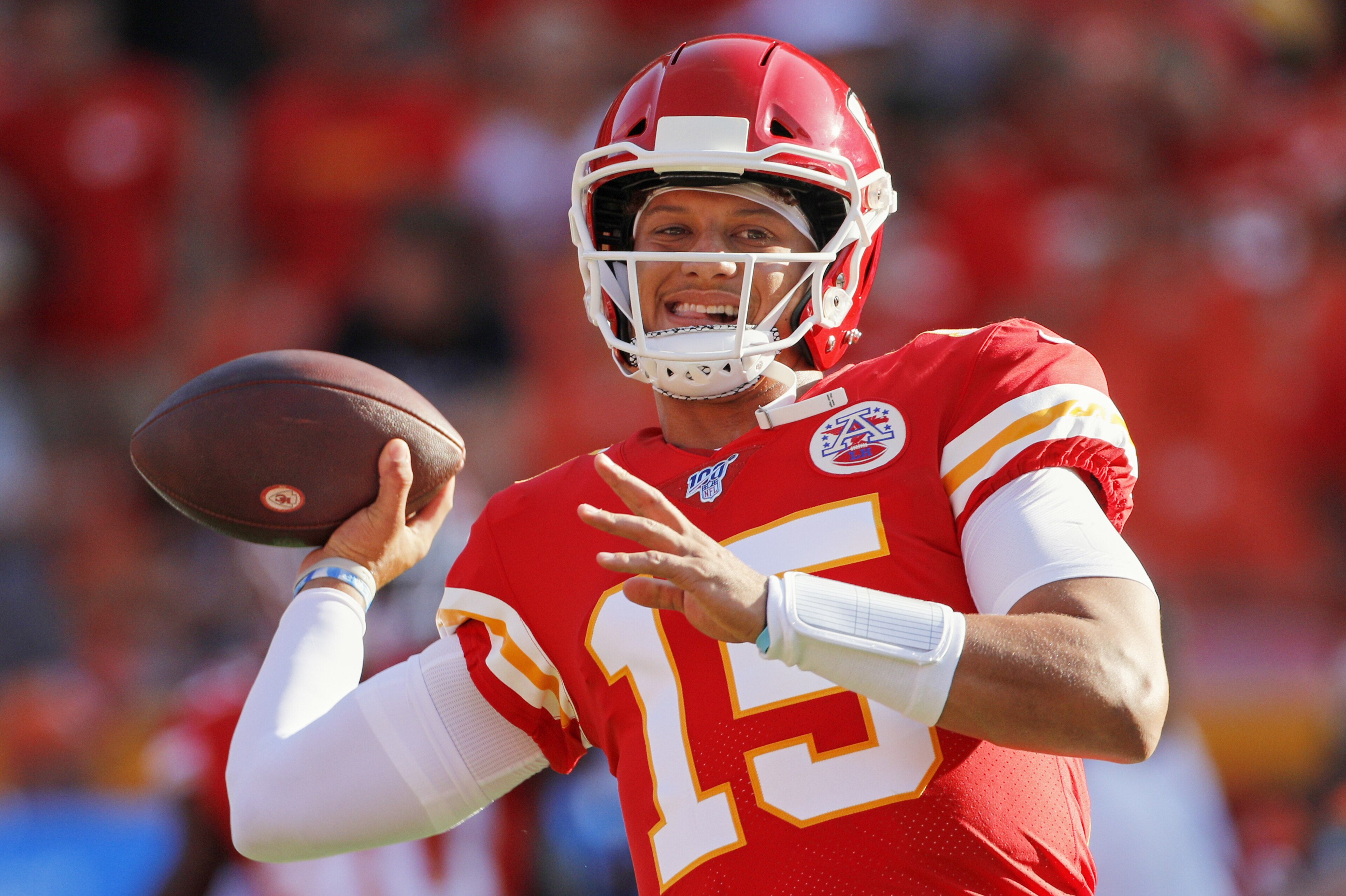 Kansas City Chiefs quarterback Patrick Mahomes (15) warms up before an NFL preseason football game against the Cincinnati Bengals in Kansas City, Mo., Saturday, Aug. 10, 2019. (AP Photo/Colin E. Braley)