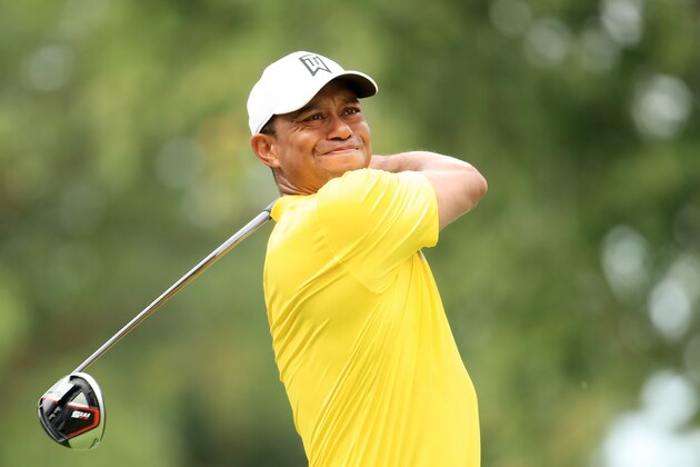 MEDINAH, ILLINOIS - AUGUST 17: Tiger Woods of the United States plays his shot from the fourth tee during the third round of the BMW Championship at Medinah Country Club No. 3 on August 17, 2019 in Medinah, Illinois. (Photo by Andrew Redington/Getty Images)
