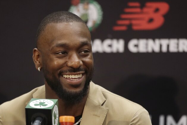 Newly acquired Boston Celtics guard Kemba Walker smiles during a news conference at the Celtics' basketball practice facility, Wednesday, July 17, 2019, in Boston. (AP Photo/Elise Amendola) Newly acquired Boston Celtics guard Kemba Walker smiles during a news conference at the Celtics' basketball practice facility, Wednesday, July 17, 2019, in Boston. (AP Photo/Elise Amendola)
