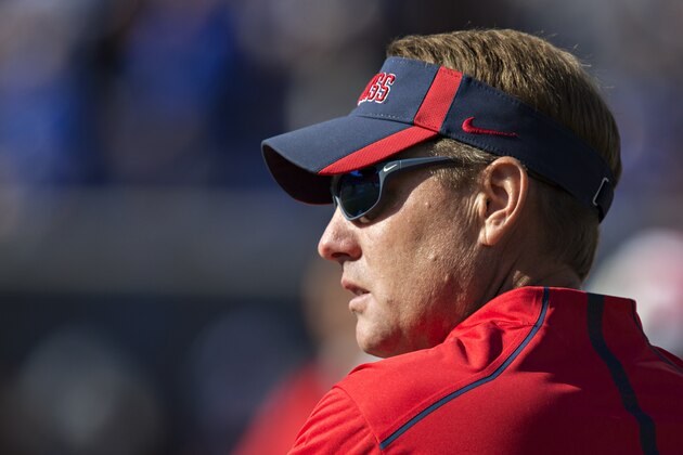 MEMPHIS, TN - OCTOBER 17:  Head Coach Hugh Freeze of the Ole Miss Rebels watches his team warm up before a game against the Memphis Tigers at Liberty Bowl Memorial Stadium on October 17, 2015 in Memphis, Tennessee.  The Tigers defeated the Rebels 37-24.  (Photo by Wesley Hitt/Getty Images)