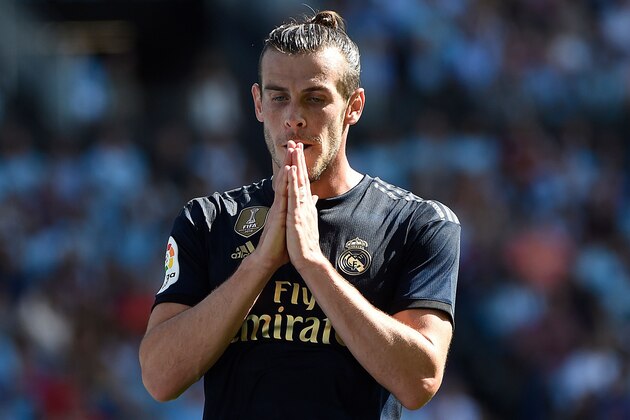 Real Madrid's Welsh forward Gareth Bale reacts after missing a goal opportunity during the Spanish League football match between Celta Vigo and Real Madrid at the Balaidos Stadium in Vigo on August 17, 2019. (Photo by MIGUEL RIOPA / AFP)        (Photo credit should read MIGUEL RIOPA/AFP/Getty Images)