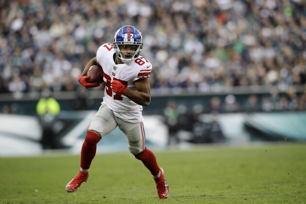 New York Giants' Sterling Shepard runs with the ball during the second half of an NFL football game against the Philadelphia Eagles, Sunday, Nov. 25, 2018, in Philadelphia. (AP Photo/Michael Perez)