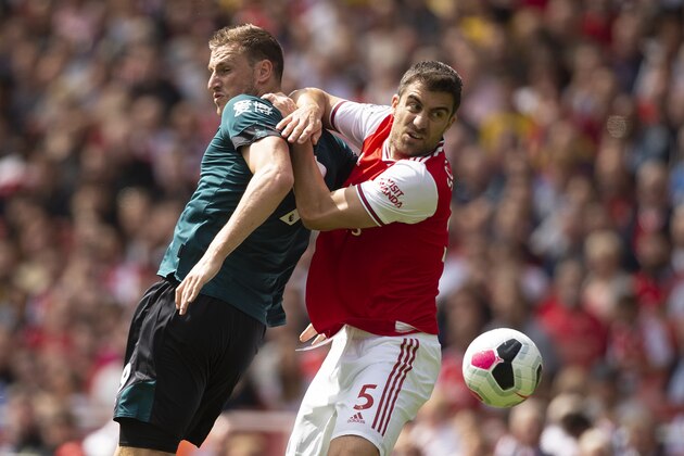 LONDON, ENGLAND - AUGUST 17:  Chris Wood of Burnley and Sokratis Papastathopoulos of Arsenal during of the Premier League match between Arsenal FC and Burnley FC at Emirates Stadium on August 17, 2019 in London, United Kingdom. (Photo by Visionhaus)