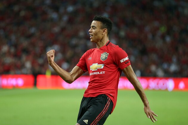 SINGAPORE, SINGAPORE - JULY 20: Mason Greenwood of Manchester United celebrates scoring a goal during the 2019 International Champions Cup match between Manchester United and FC Internazionale at the Singapore National Stadium on July 20, 2019 in Singapore. (Photo by Lionel Ng/Getty Images)