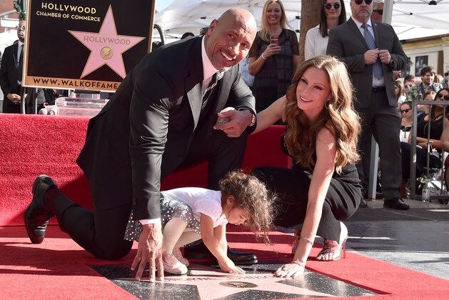 HOLLYWOOD, CA - DECEMBER 13:  Actor Dwayne Johnson, Jasmine Johnson and singer Lauren Hashian attend a ceremony honoring Dwayne Johnson with the 2,624th star on the Hollywood Walk of Fame on December 13, 2017 in Hollywood, California.  (Photo by Alberto E. Rodriguez/Getty Images)