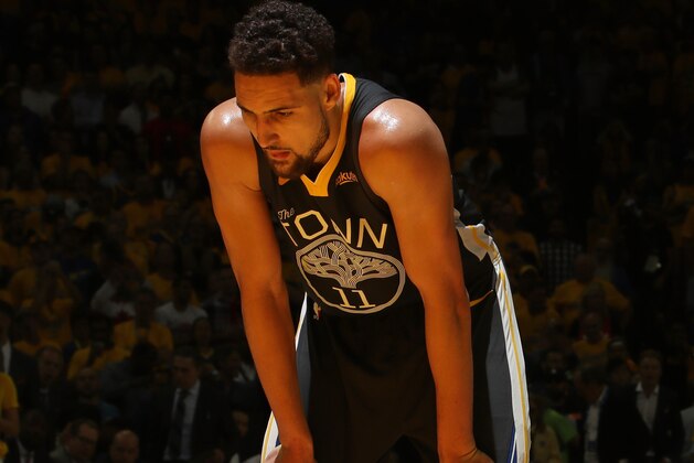 OAKLAND, CA - JUNE 13: Klay Thompson #11 of the Golden State Warriors looks on prior to his foul shot after injuring his knee against the Toronto Raptors during Game Six of the 2019 NBA Finals on June 13, 2019 at ORACLE Arena in Oakland, California. NOTE TO USER: User expressly acknowledges and agrees that, by downloading and/or using this photograph, user is consenting to the terms and conditions of Getty Images License Agreement. Mandatory Copyright Notice: Copyright 2019 NBAE (Photo by Nathaniel S. Butler/NBAE via Getty Images)