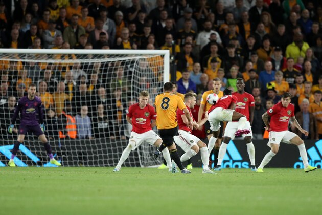 WOLVERHAMPTON, ENGLAND - AUGUST 19: Ruben Neves of Wolverhampton Wanderers scores his team's first goal during the Premier League match between Wolverhampton Wanderers and Manchester United at Molineux on August 19, 2019 in Wolverhampton, United Kingdom. (Photo by David Rogers/Getty Images)