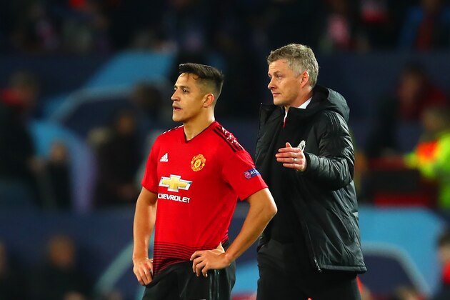 MANCHESTER, ENGLAND - FEBRUARY 12:   Manchester United Head Coach / Manager Ole Gunnar Solskjaer consoles Alexis Sanchez of Manchester United at the end of the UEFA Champions League Round of 16 First Leg match between Manchester United and Paris Saint-Germain at Old Trafford on February 12, 2019 in Manchester, England. (Photo by Robbie Jay Barratt - AMA/Getty Images)